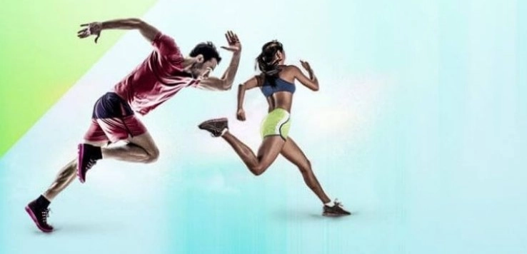 Muškarac i žena trče u sportskoj odjeći